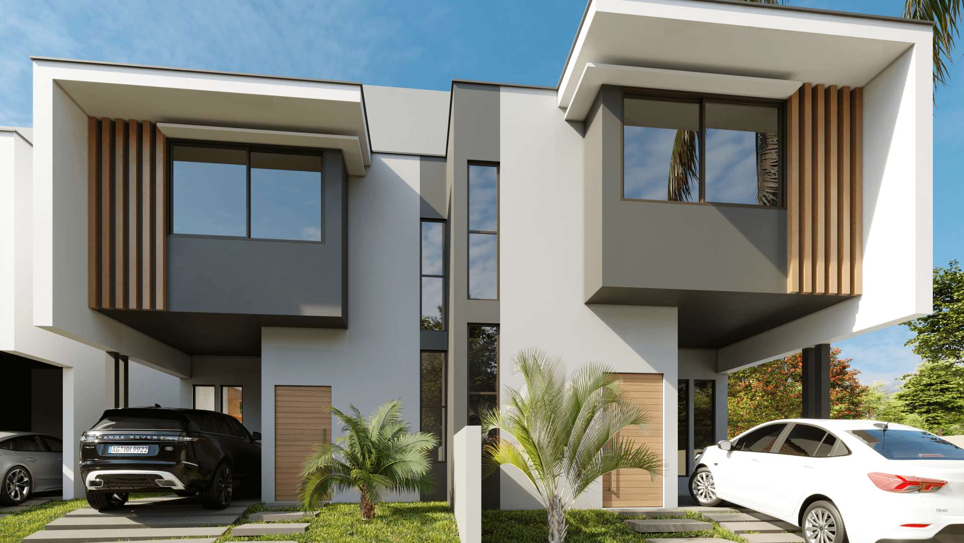 Imagem de casa com duas garagens.